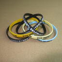 Slim Silicone Wristbands (6mm wide) with custom text image